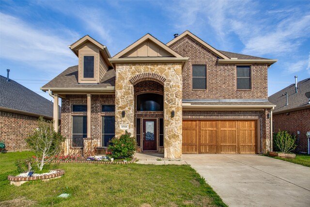 view of front facade featuring a garage and a front yard