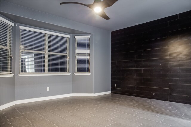 empty room featuring ceiling fan