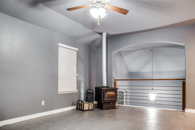 living room with lofted ceiling, hardwood / wood-style floors, and ceiling fan