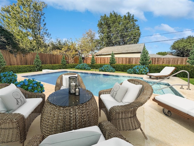 view of pool with a patio