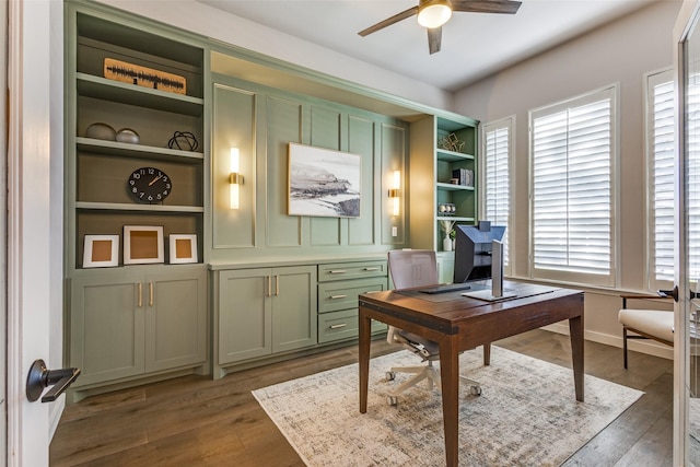 office space featuring ceiling fan and dark wood-type flooring