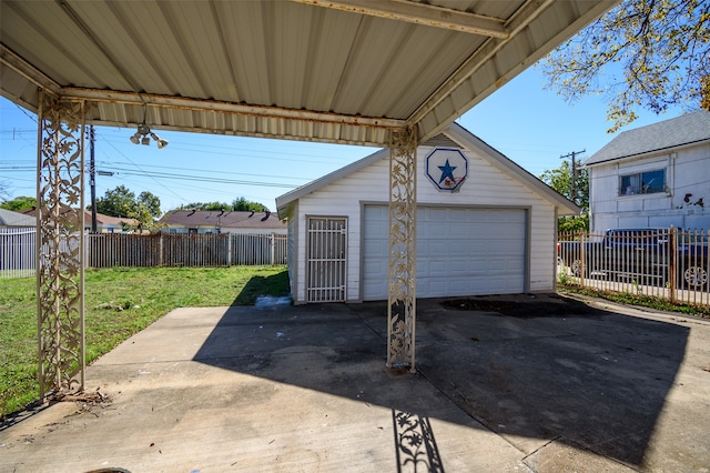 garage with a yard