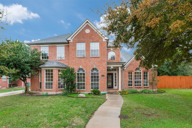 view of front of property with a front lawn