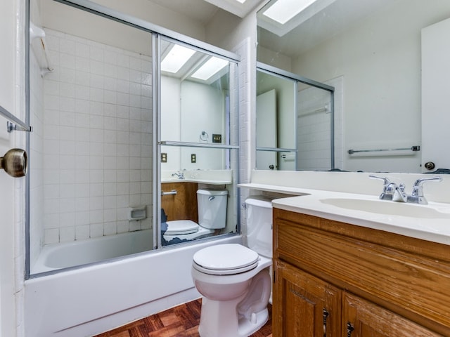 full bathroom with toilet, bath / shower combo with glass door, vanity, a skylight, and parquet flooring