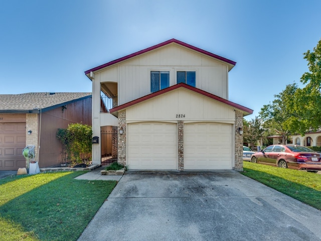 view of front of home featuring a front yard and a garage