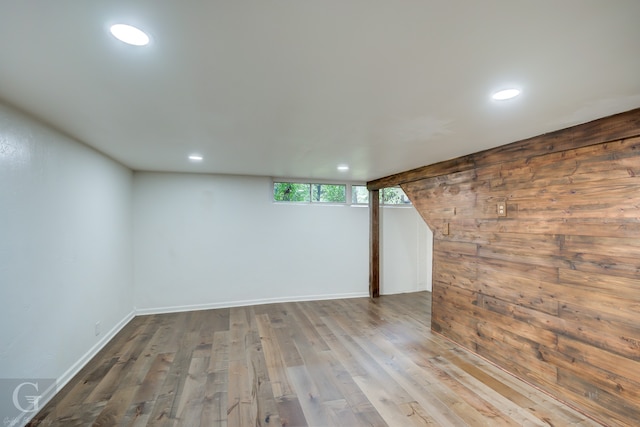 basement featuring hardwood / wood-style flooring