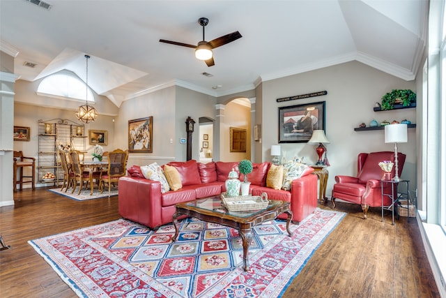 living room featuring hardwood / wood-style floors, ceiling fan with notable chandelier, lofted ceiling, and ornamental molding