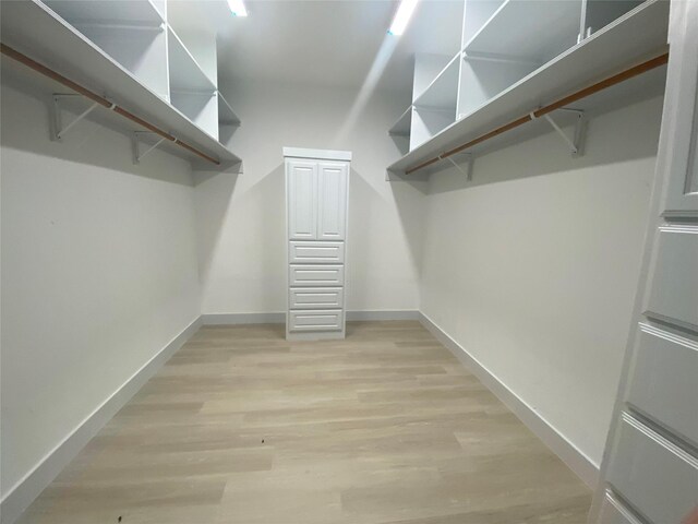 unfurnished room with dark wood-type flooring