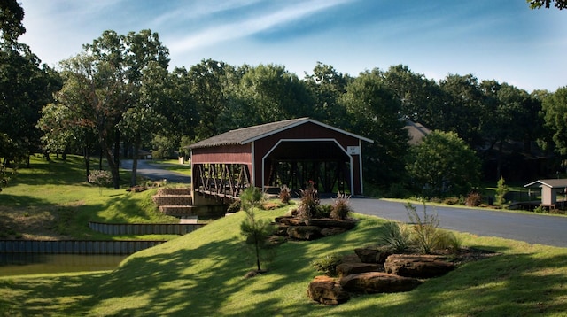 view of community featuring a yard