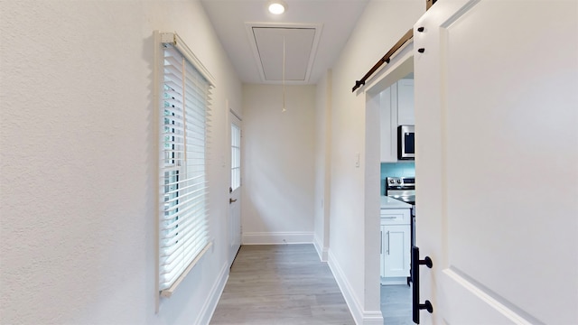 hall featuring light hardwood / wood-style flooring