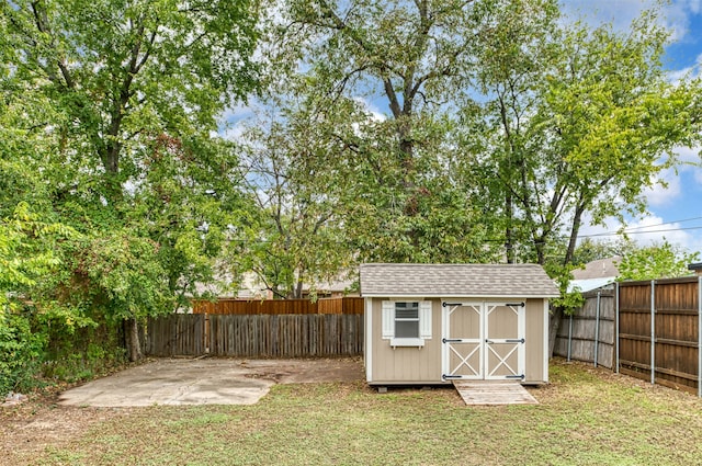 view of outdoor structure with a lawn