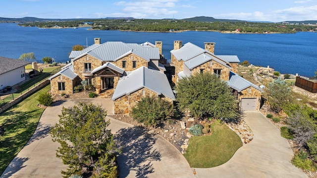 drone / aerial view with a water view