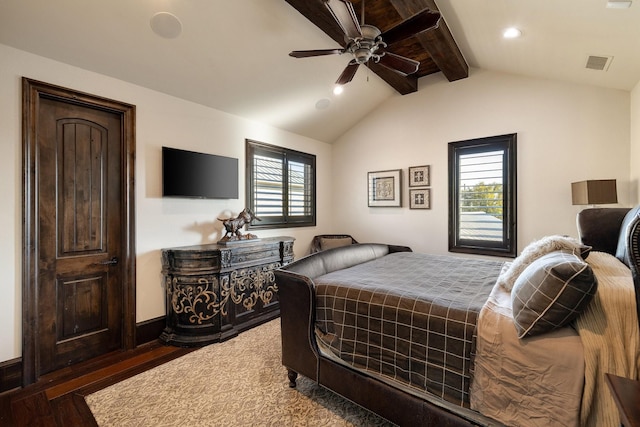 bedroom with ceiling fan, vaulted ceiling with beams, and dark hardwood / wood-style floors