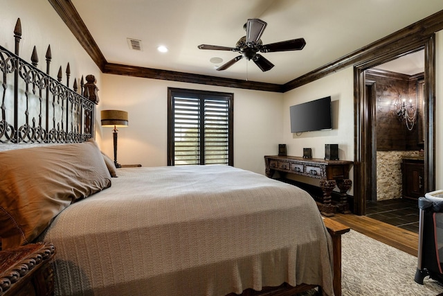 bedroom with hardwood / wood-style floors, crown molding, and ceiling fan