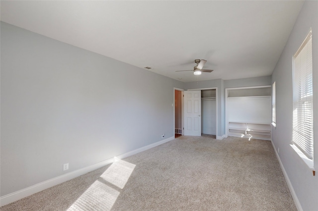 unfurnished bedroom with light carpet and ceiling fan