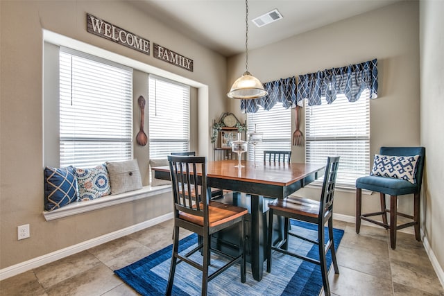 dining space with plenty of natural light