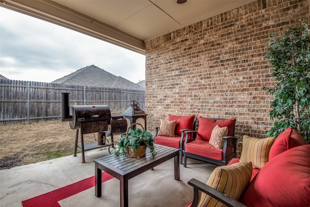 view of patio featuring a grill