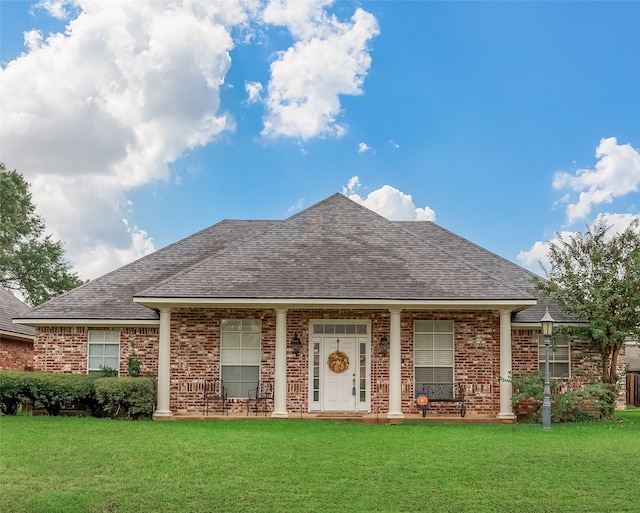 view of front of property with a front lawn