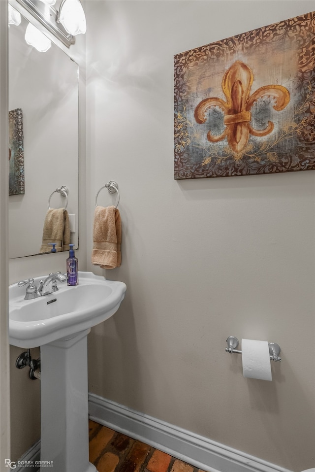 bathroom featuring wood-type flooring