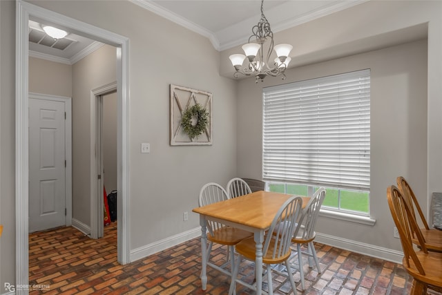 dining area featuring an inviting chandelier and ornamental molding