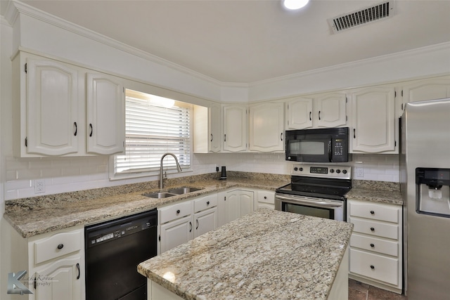 kitchen featuring white cabinetry, black appliances, sink, and light stone countertops