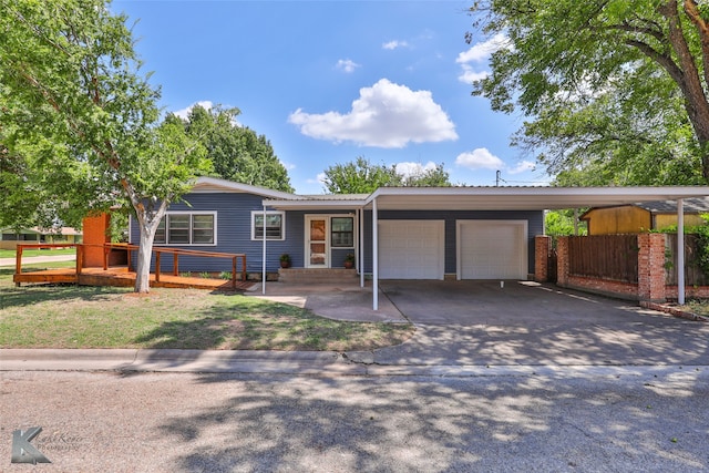 view of front of home with a garage and a front yard