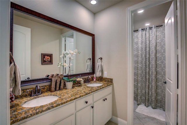 bathroom featuring vanity and tile patterned flooring