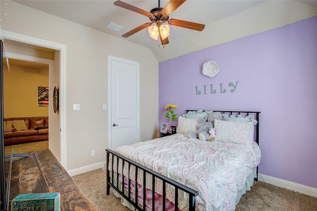 carpeted bedroom featuring ceiling fan and lofted ceiling