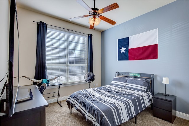 carpeted bedroom featuring ceiling fan