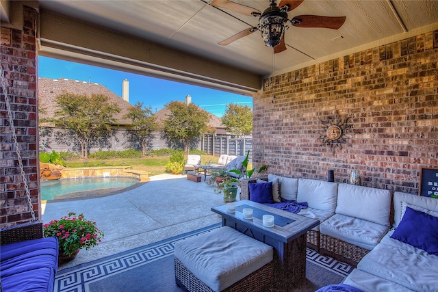 view of patio / terrace featuring pool water feature, an outdoor hangout area, and ceiling fan