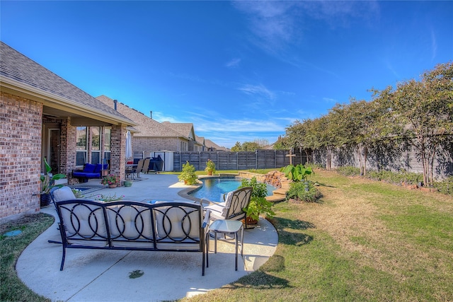 exterior space featuring a fenced in pool and an outdoor hangout area