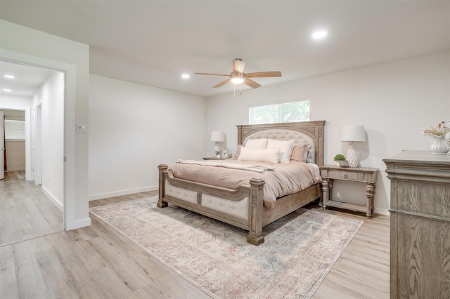 bedroom featuring ceiling fan and light wood-type flooring