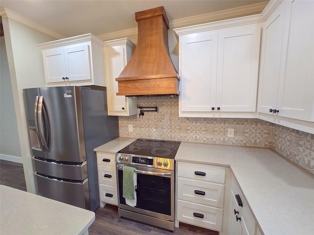 kitchen featuring white cabinets, custom range hood, stainless steel appliances, and light countertops