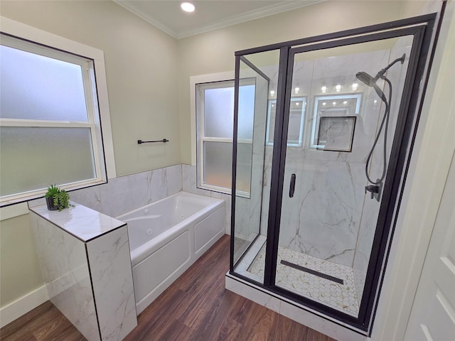 full bath with a whirlpool tub, ornamental molding, wood finished floors, and a marble finish shower