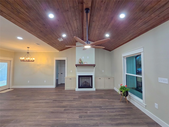 unfurnished living room with baseboards, visible vents, vaulted ceiling, a fireplace, and recessed lighting