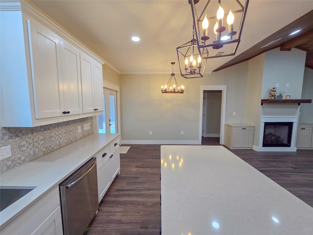 kitchen with a fireplace, light countertops, backsplash, white cabinetry, and dishwasher