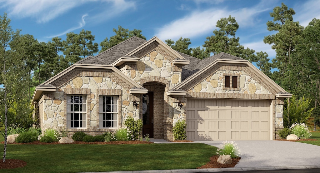 view of front facade featuring a garage and a front yard