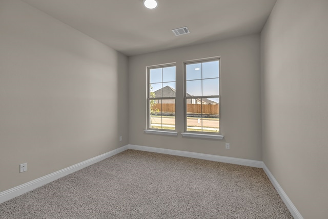 view of carpeted spare room