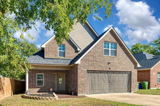 view of front of property featuring a garage