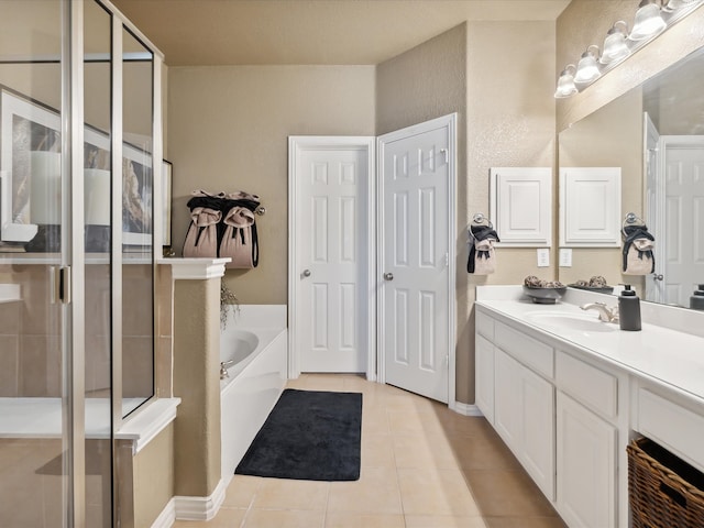 bathroom featuring vanity, separate shower and tub, and tile patterned floors