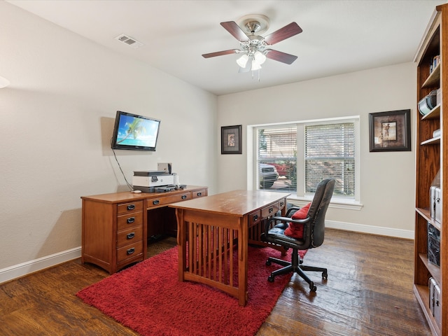 office with dark hardwood / wood-style floors and ceiling fan