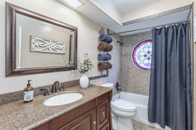 full bathroom featuring shower / bath combo, tile patterned flooring, vanity, and toilet