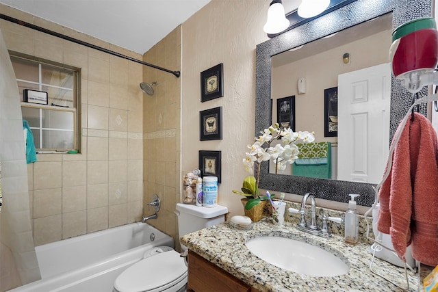 full bathroom featuring toilet, vanity, and shower / bath combination with curtain