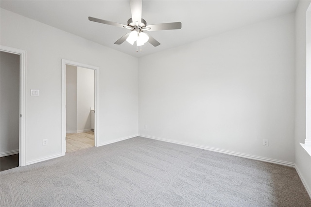 bathroom with a shower with door and vanity