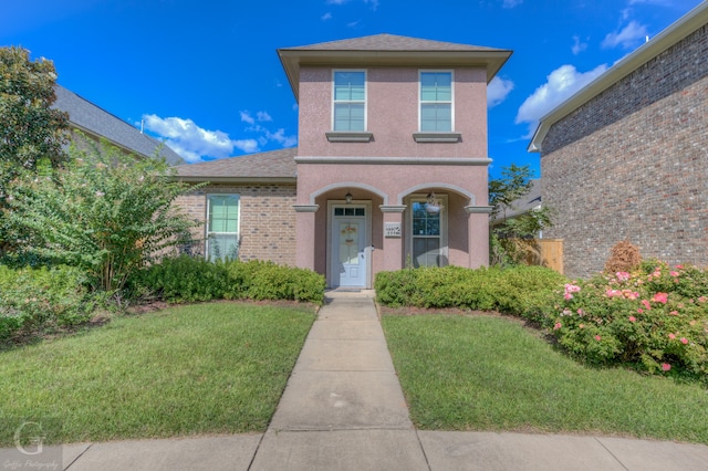 front of property with a front lawn