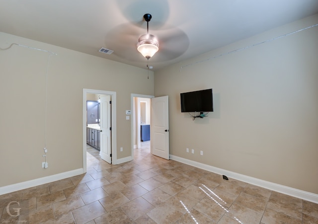 empty room featuring ceiling fan