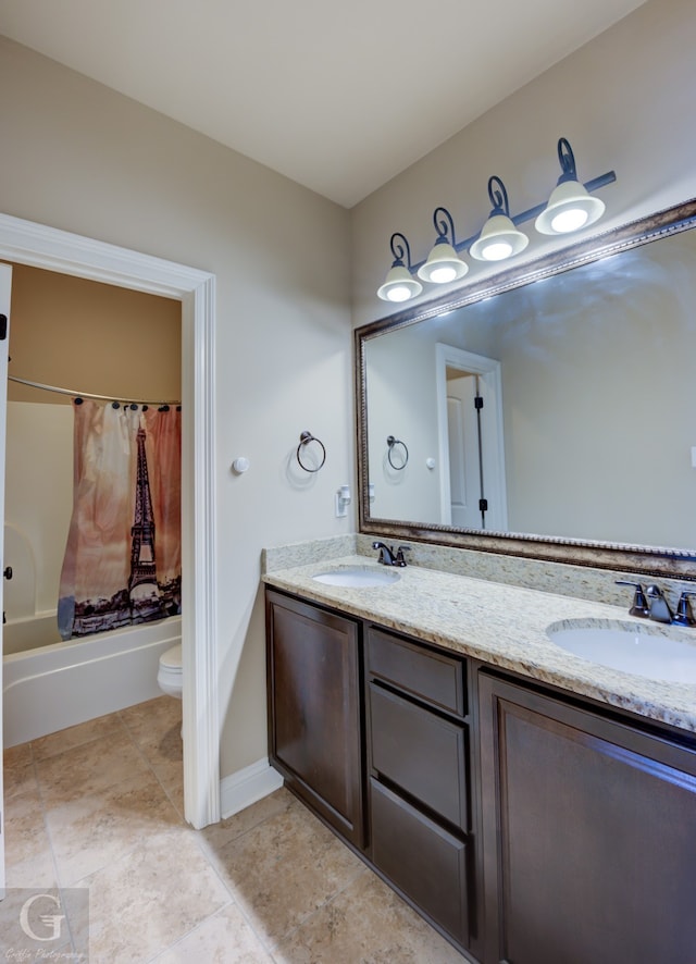 full bathroom featuring toilet, tub / shower combination, and vanity