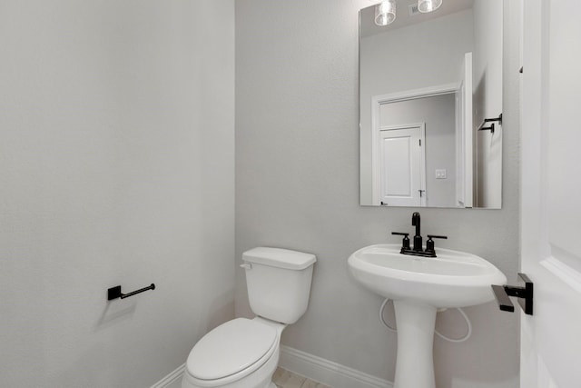 219 Briarwood Dr, Nevada, TX 75173 - bathroom featuring toilet and baseboards