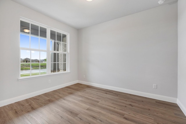 219 Briarwood Dr, Nevada, TX 75173 - empty room featuring baseboards and wood finished floors