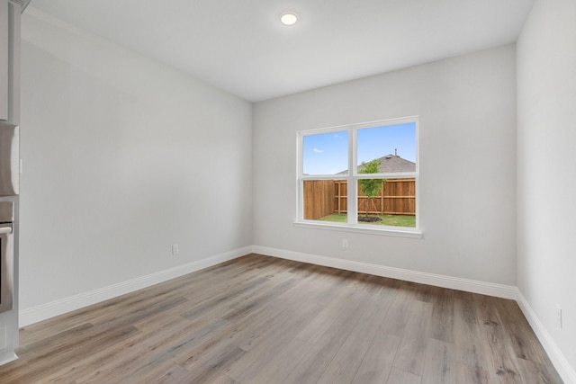 219 Briarwood Dr, Nevada, TX 75173 - spare room featuring light wood-style flooring and baseboards